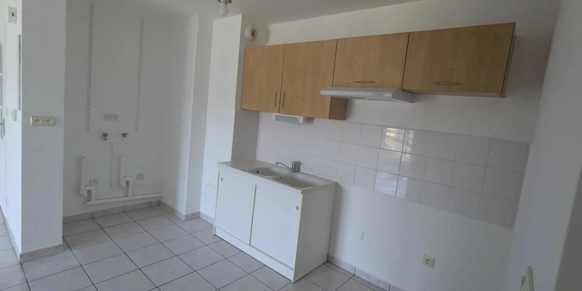 vue cuisine aménagée appartement T3 à vendre sur Tours, proche piscine du Lac | Vente 37